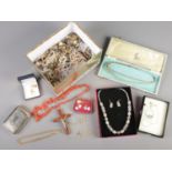 A box of costume jewellery. Including coral necklace, pearl necklaces with silver clasps,