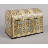 A 19th century dome topped stationary box with mother of pearl, brass and enamel inlaid