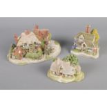 A quantity of Lilliput Lane figures including example from the Blaise Hamlet collection.