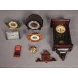 A quantity of clocks including, eight day Westminster chime wall clock, four mantel clocks and two