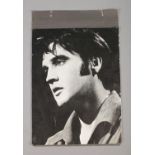 An Elvis Presley monochrome picture. bears inscription Best wishes Elvis Presley.