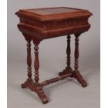 A Victorian satinwood work box with turned supports, hinged lid and pull out drawer.