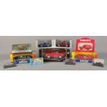 A quantity of boxed die cast vehicles, including Dinky, Lledo and Motor Max examples. Some boxes