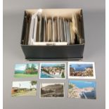A box of approx. 750 postcards dating from 1950 onwards. Includes European and American examples.