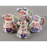 Four graduating Masons Hydra jugs decorated in the Japan Basket pattern. Tallest 21.5cm.