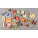 A collection of vintage dummy tobacco and cigarette packets.