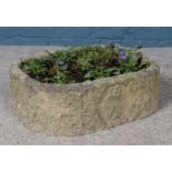 A concrete planter with bird detailing to the front. Height 20cm, Width 60cm, Depth 45cm.