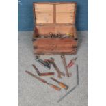 A pine tool chest complete with an assortment of vintage tools, include files, spanners etc.