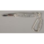 A silver handled pen knife. The blade stamped for Rodgers. Assayed London 2000 by Chamberlain Clarke
