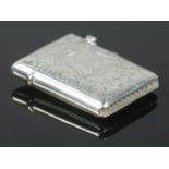 An Edwardian silver vesta case with engraved decoration and cartouche. Assayed for Birmingham,