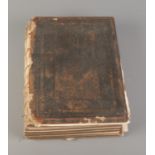 A William Collins & Sons family bible condensed by Rev. John McFarlane. Badly damaged spine.