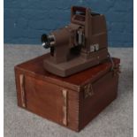 A Kershaw Model 250 slide projector in original wooden case with instructions.