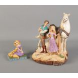 A pair of Disney's Tangled figures including large Rapunzel with Horse and traditions figure.