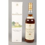 The Macallan; A full, boxed and sealed bottle of 10 years old Single Highland Malt Scotch Whisky.