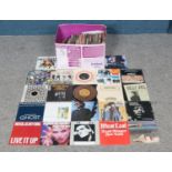 A box of assorted rock and pop single vinyl records. To include Mungo Jerry, Billy Joel, The