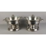 A pair of cooking pots with detachable burners.