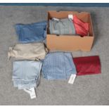 A box of vintage trousers most new with original tags.