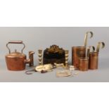 An assortment of collectables, to include a pair of brass candlesticks, copper and brass pint