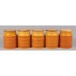 Five Hornsea Saffron storage jars. Includes Tea, Coffee and Sugar.