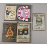 Five advertising signs for Gallaher and Ogden's cigarettes/tobacco, including four metal examples.