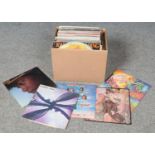 A box of LP records. Includes Santana, The Seekers, Elton John, Neil Diamond etc.