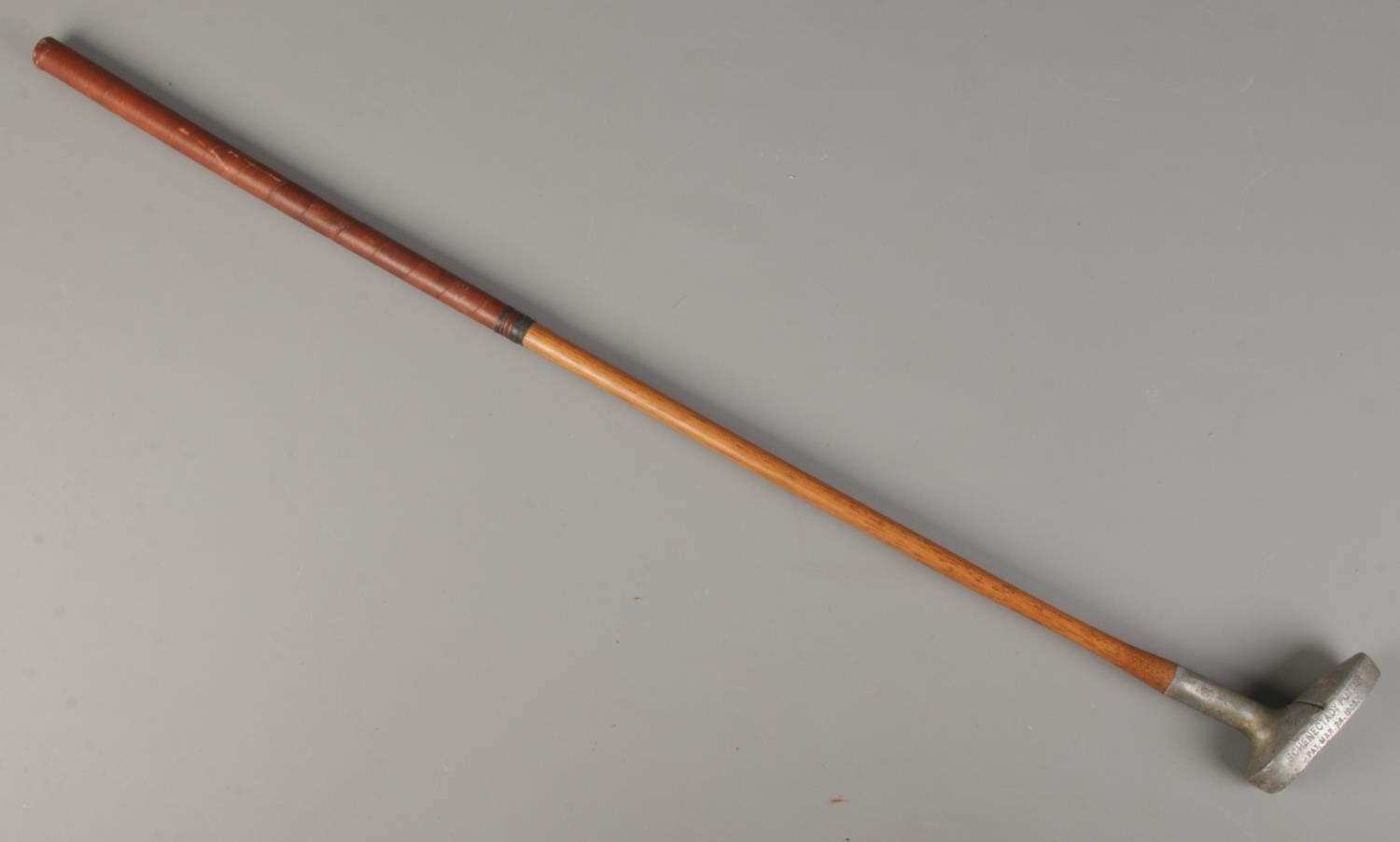 An antique Harry C Lee Schenectady putter with hickory shaft. Dated March 24 1903.