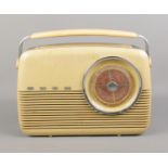 A Bush 'Antique' radio in cream.