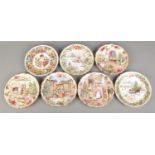 A collection of seven Royal Albert Christmas cabinet plates. To include 'The Coaching Inn at