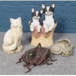 A collection of garden ornaments; including composite cat doorstop/stick stand, concrete cat