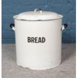 A large enamel bread bin with lid. Approx. dimensions 37cm x 40cm diameter (not including handles)