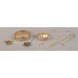 A collection of Gold Plated items to include rolled gold bangle, 9ct Gold crucifix on chain and an