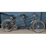 A vintage D.D Enterprise tandem bicycle, with Shimano Deore gears. Slight rust to peadles.