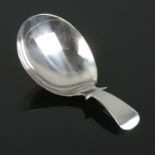 A George III silver caddy spoon. Assayed for Birmingham, 1812. Total weight: 6.88g.