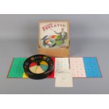 A boxed Poolette 'Your Roulette' game with wheel, bearings, gameboard and rules book. Chips missing.