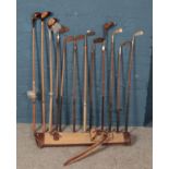 A quantity of vintage golf clubs. Including Barkers, Winton, etc.