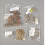 A large quantity of assorted coins. Including Great British pennies, 3d bits, US and Canadian