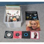 A box of assorted records including selection of singles. To include Doris Day, Tammy Wynette, Nat