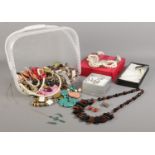 A very large collection of costume jewellery, to include necklaces, silver jewellery suite,