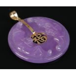 A 9ct Gold and 'Lavender Jade' Chinese Pendant.