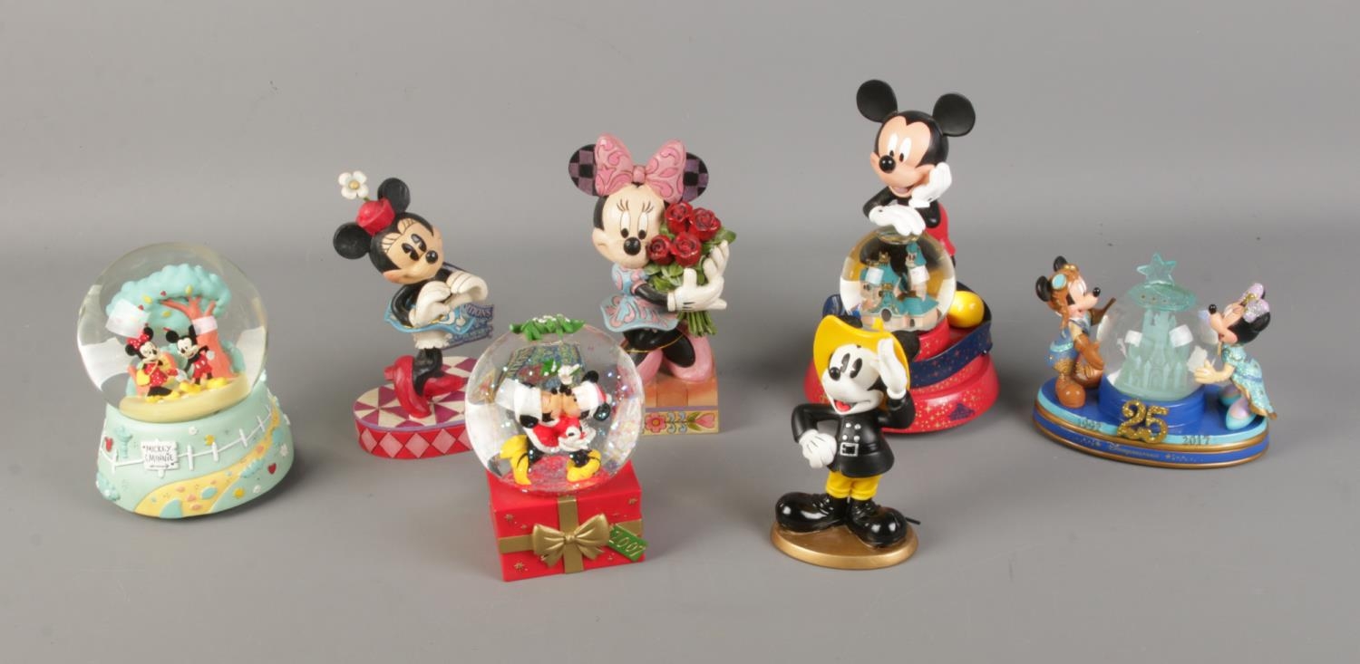 A quantity of assorted Disney's Mickey and Minnie Mouse figures including snow globe and