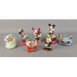 A quantity of assorted Disney's Mickey and Minnie Mouse figures including snow globe and