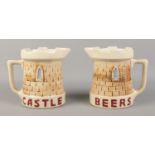 Two 'Castle Beers' ceramic water jugs. Slight chip to the rim of one example.