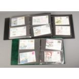 Three large albums containing a selection of RAF first day covers, including many signed (