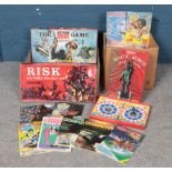 A collection of vintage board games and computer magazines. To include Risk and The Magic Robot.