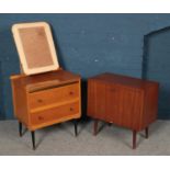 A three drawer dressing table with built in mirror frame (mirror is missing) along with record