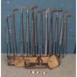 A quantity of vintage golf clubs. Including Thistle, Tom Gillies, Maxwell Mashie, Halley putter,