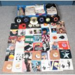 A large collection of rock and pop single vinyl records. To include: John Lennon, Amen Corner,
