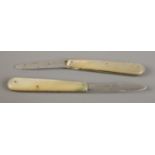 Two Victorian silver bladed and mother of pearl folding fruit knives. One assayed for Birmingham,