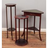 Three occasional pieces of furniture. Includes two jardiniÃ¨re stands and a corner table.