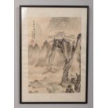A framed Chinese watercolour on material, depicting landscape scenes and calligraphy. 40cm x 28cm.